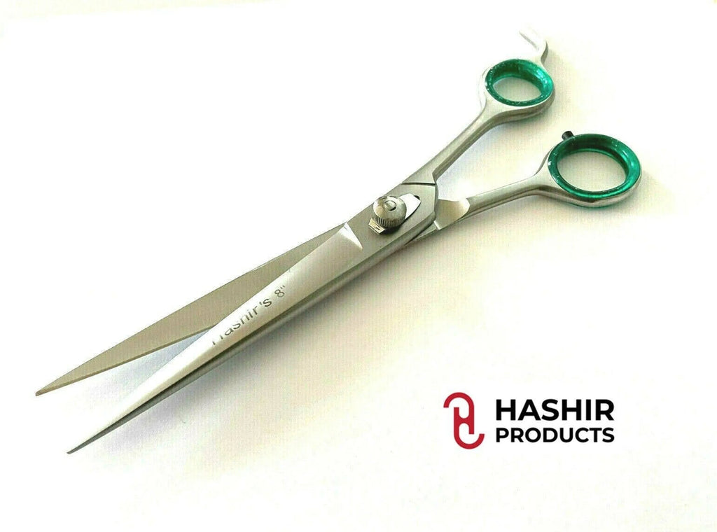 Hair cutting shears with green handles on a white background, featuring Hashir Products logo.