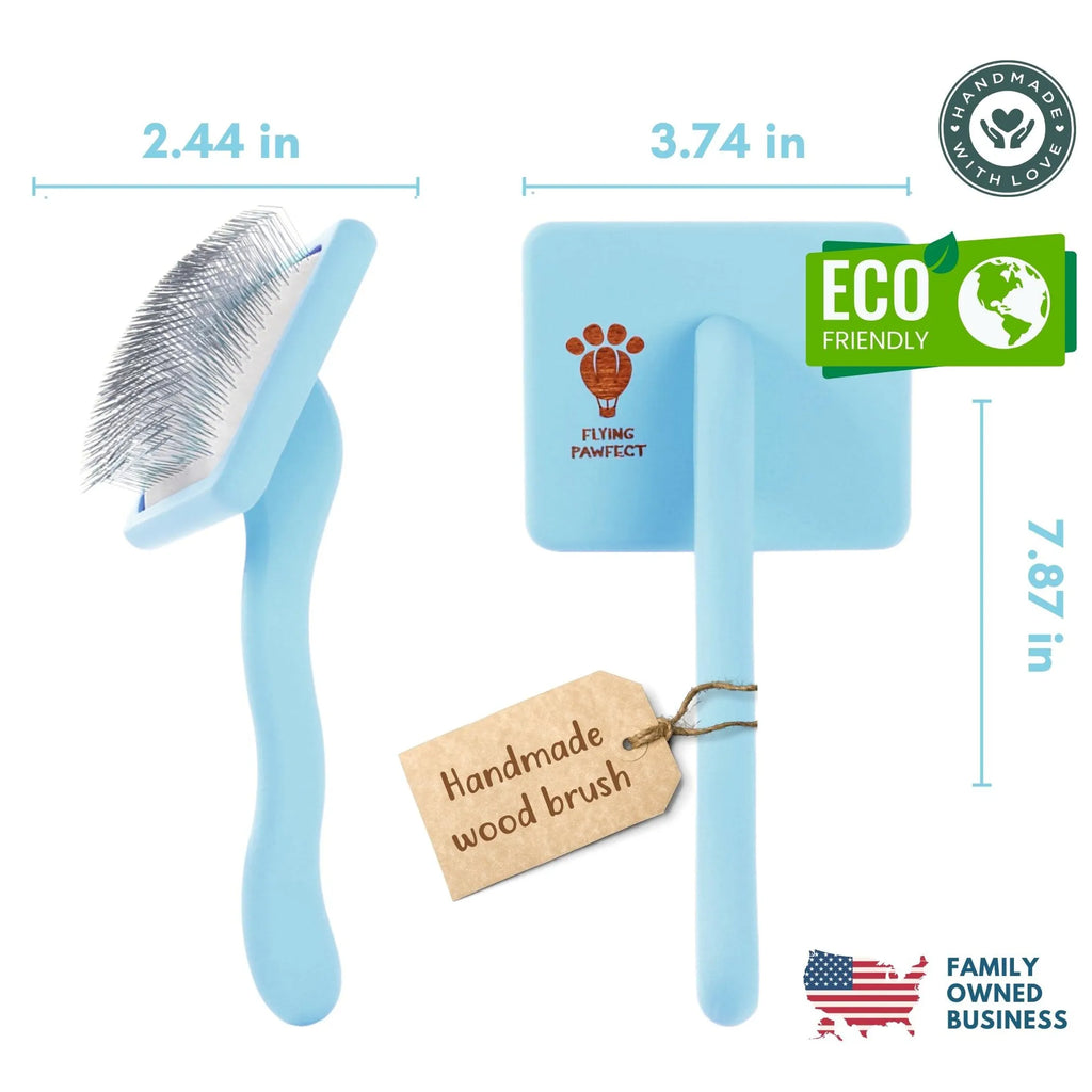 Blue pet grooming brush with measurements and eco-friendly label on a white background
