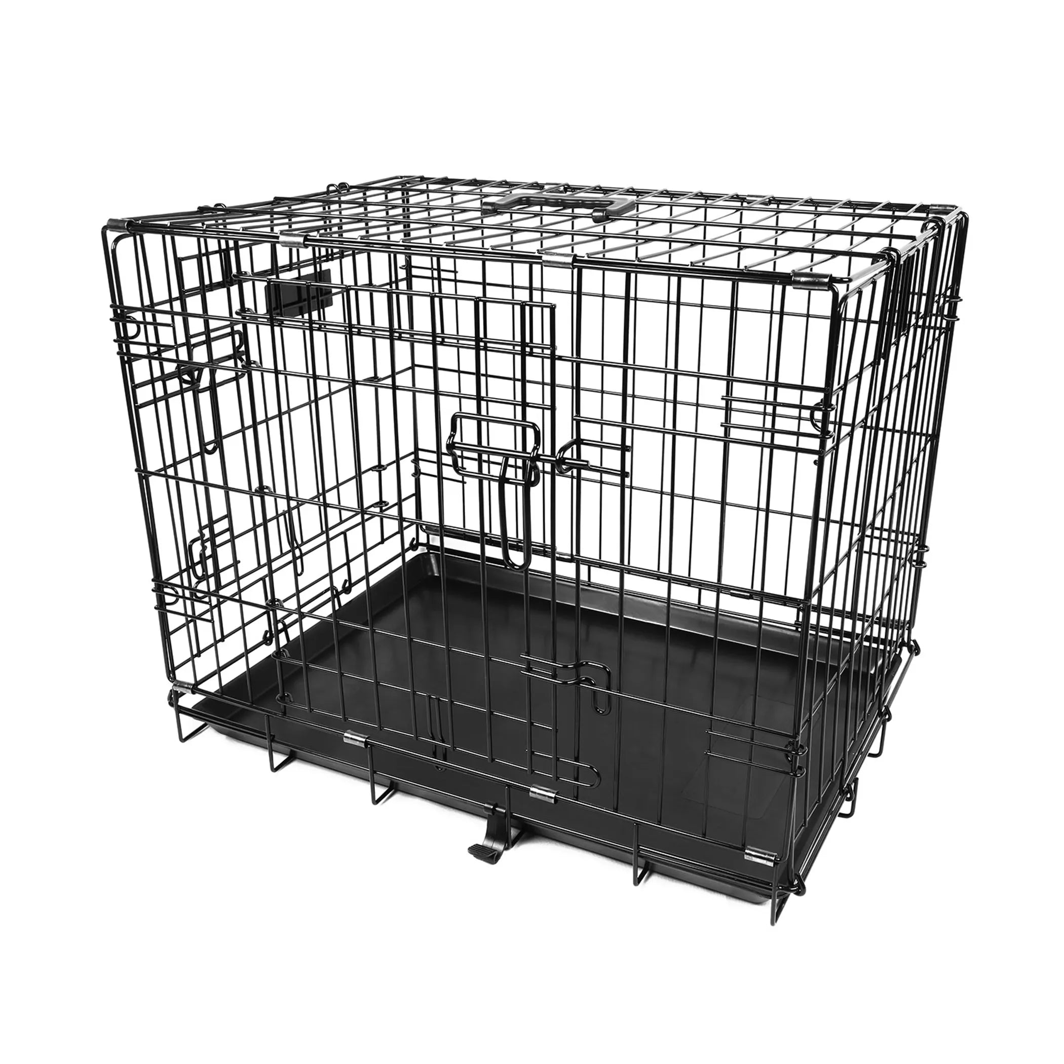 Black metal dog crate on a white background