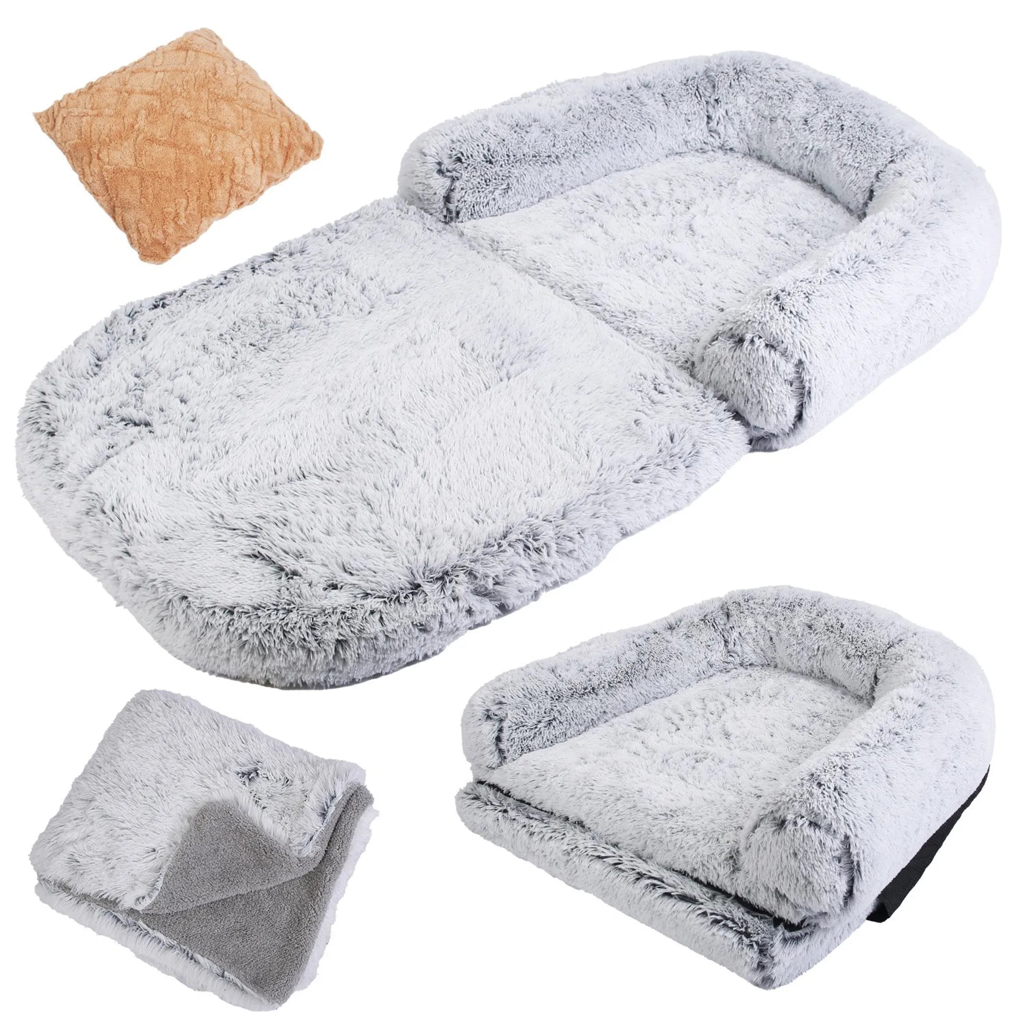 Gray pet bed with a smaller version of itself, a pillow, and a blanket on a white background.