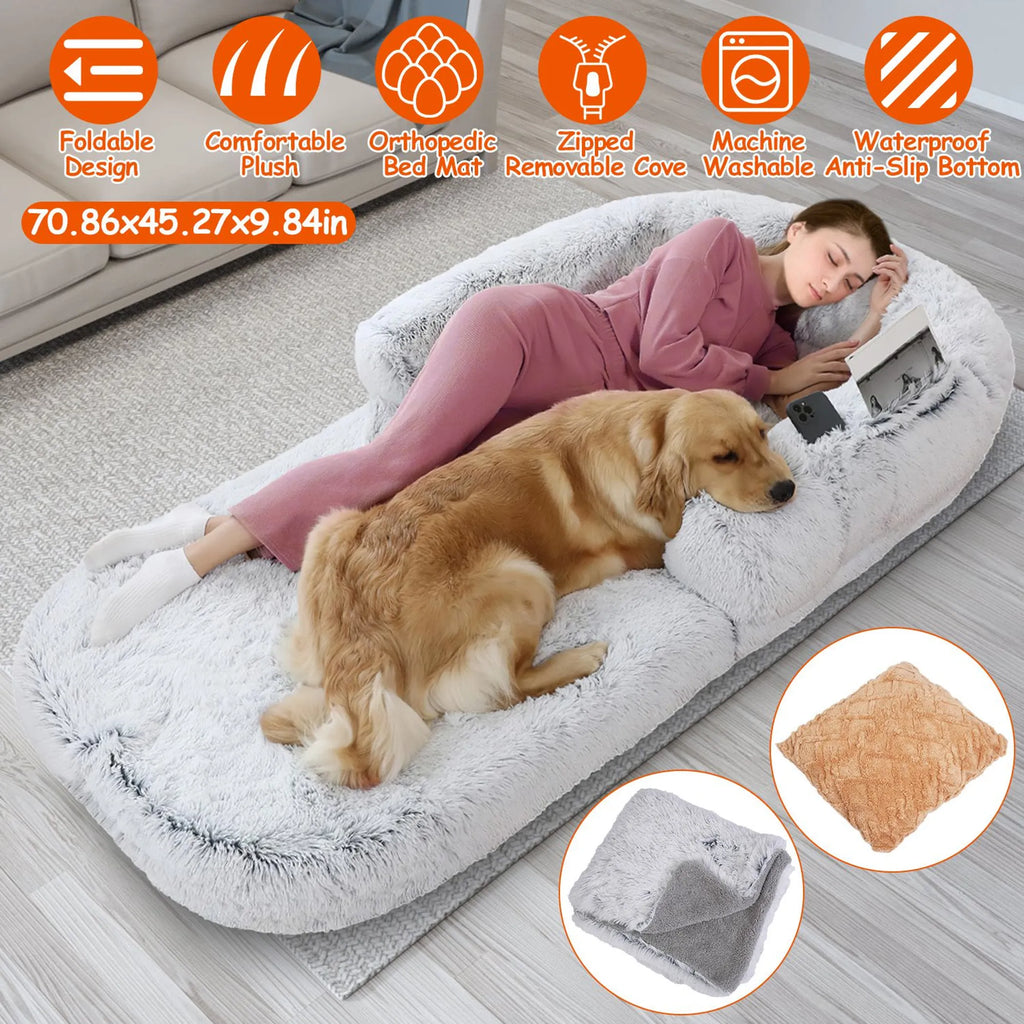 Woman and dog lying on a large orthopedic bed mat with product features displayed.