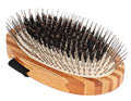 Wooden hairbrush with black bristles on a white background