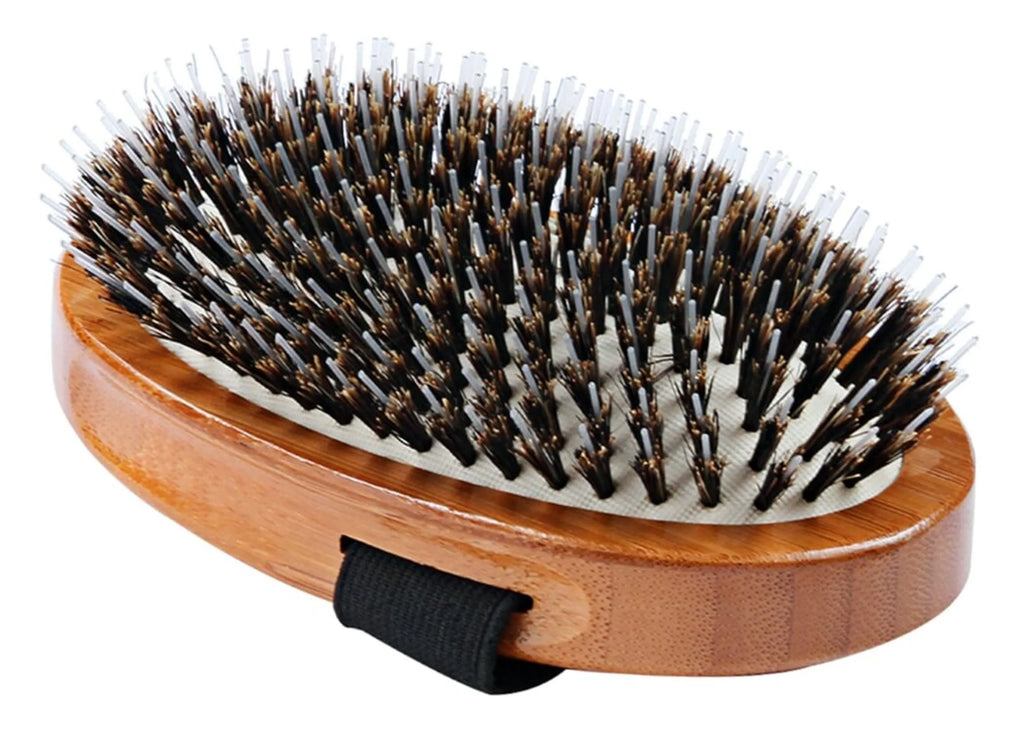 Wooden hairbrush with bristles on a white background