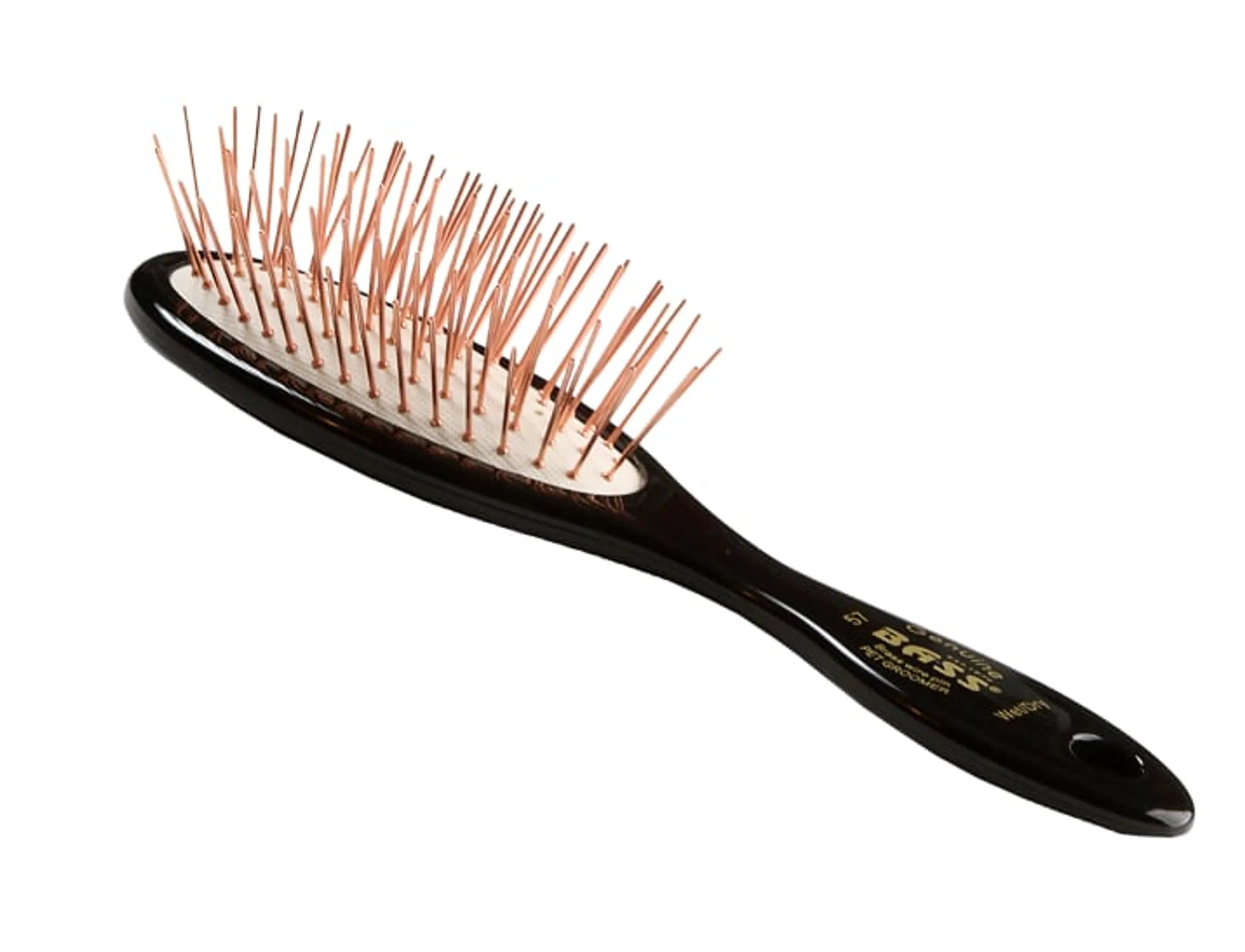 Black hairbrush with rose gold pins on a white background