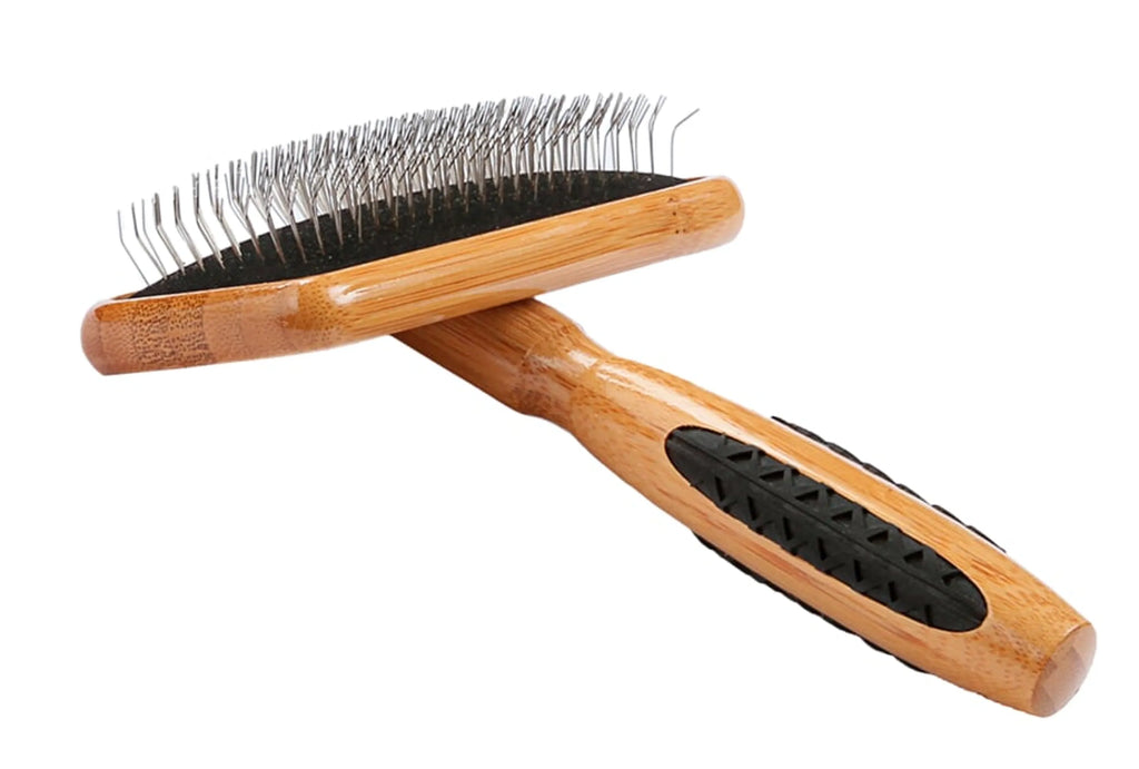 Two wooden pet grooming brushes with black rubber blocks on a white background
