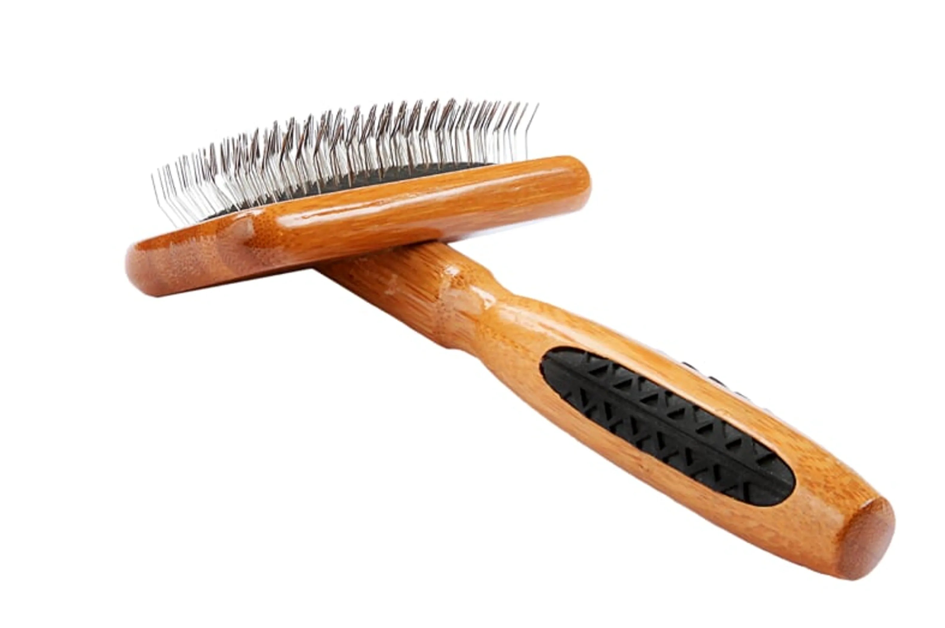 Wooden pet grooming brush with metal bristles on a white background